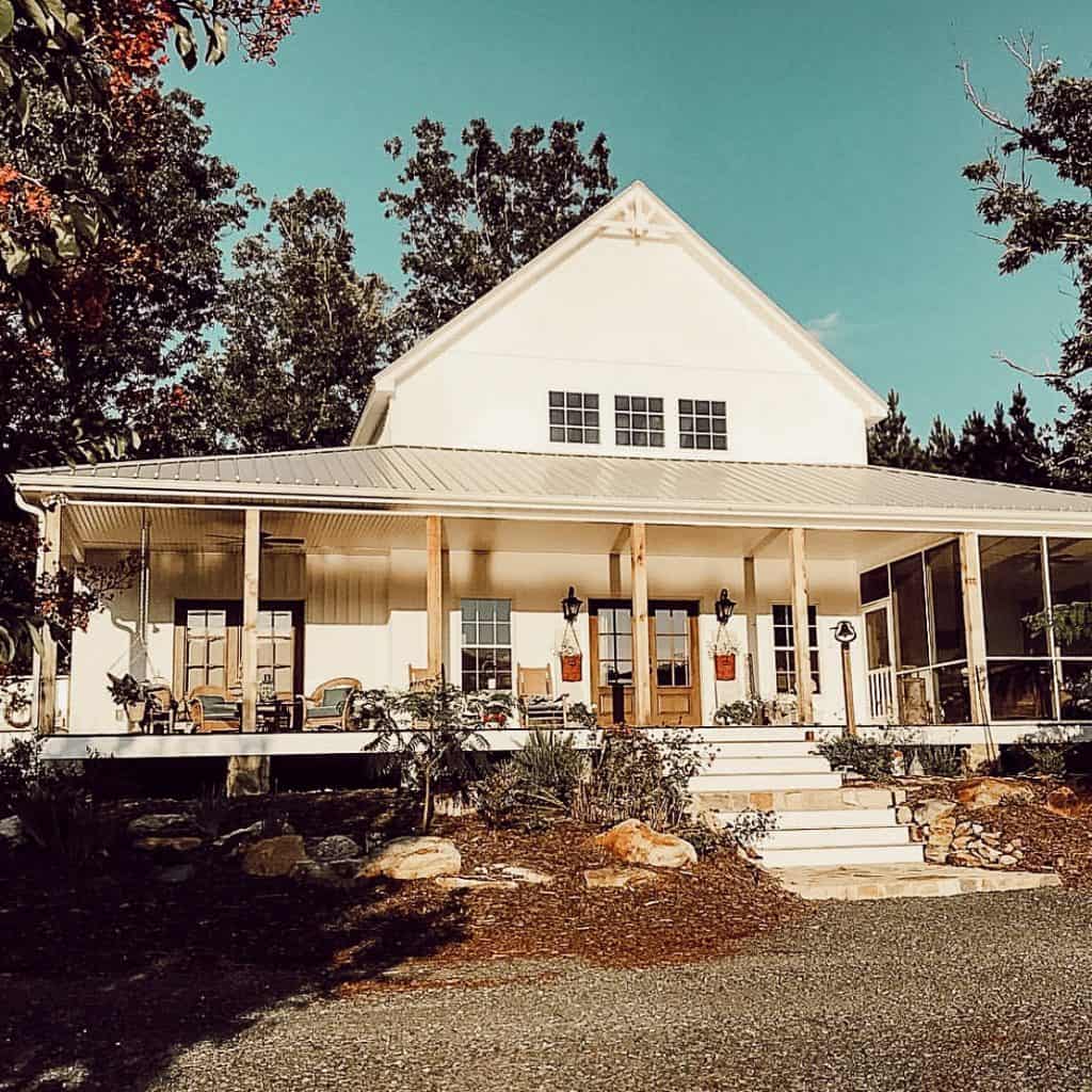 Dream Farmhouse. Large front porch with attached screened porch.