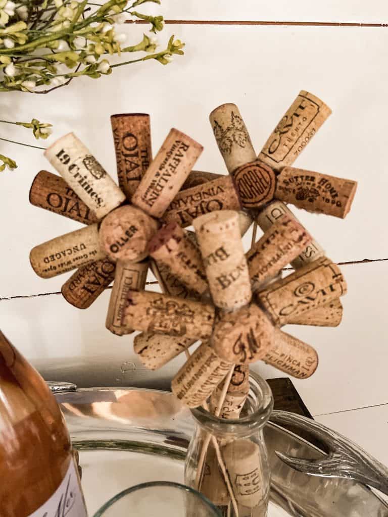 Wine cork flowers. Unique wine cork ideas. Uses for used wine corks.