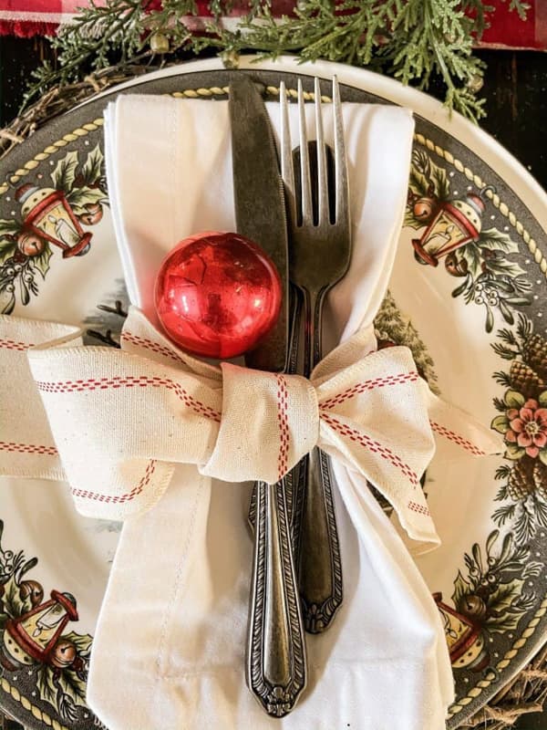 Christmas Plate with Vintage Christmas Ornament on napkin ring bow