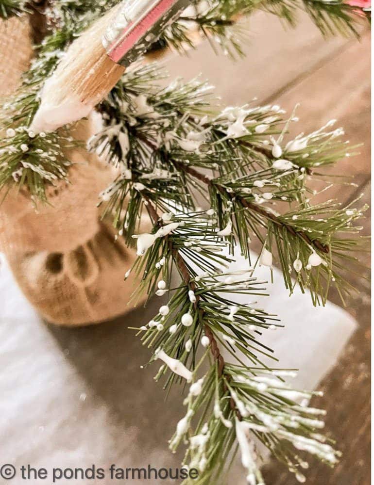 Use fake snow for a cheap and festive vase filler (thanks, Pottery