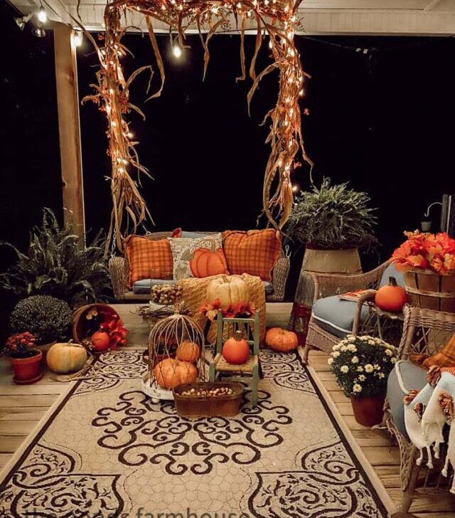 cropped-Fall-Swing-on-Farmhouse-Front-Porch-with-lights-evening-view.jpg