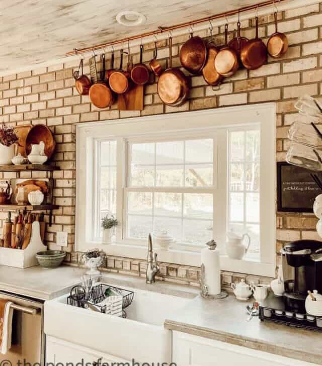 cropped-DIY-Copper-Pot-Hanging-Rack-copper-pots-on-brick-wall-in-kitchen.jpg