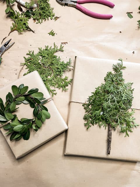 How To Tie A Gift Bow Perfectly Every Time   Group Of Packages With Natural Greenery 480x640 