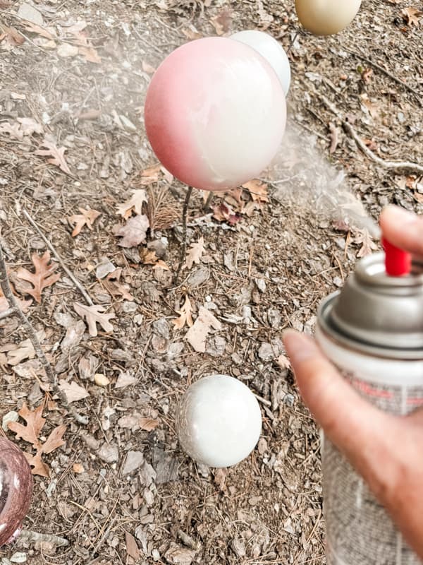 Spray paint ornament with chalky white paint.