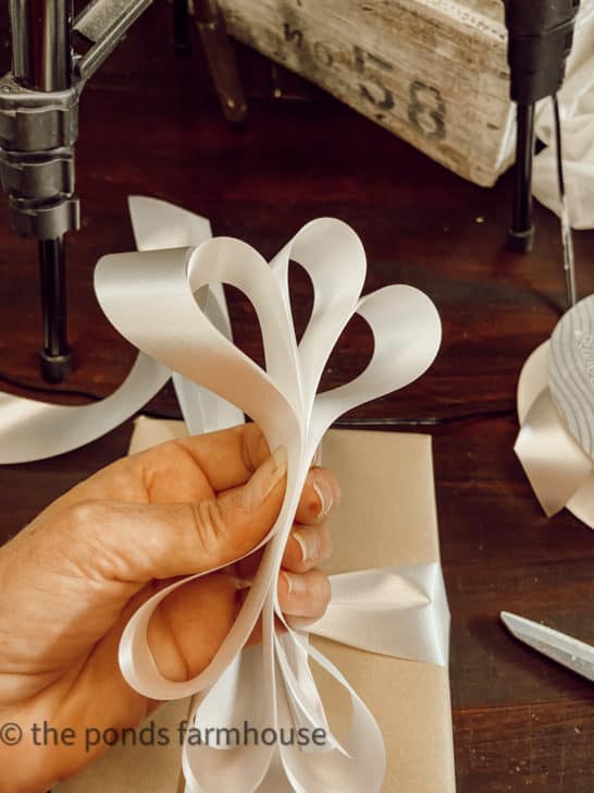 How To Tie A Gift Bow Perfectly Every Time   Build Ribbon To Desired Thickness 546x728 