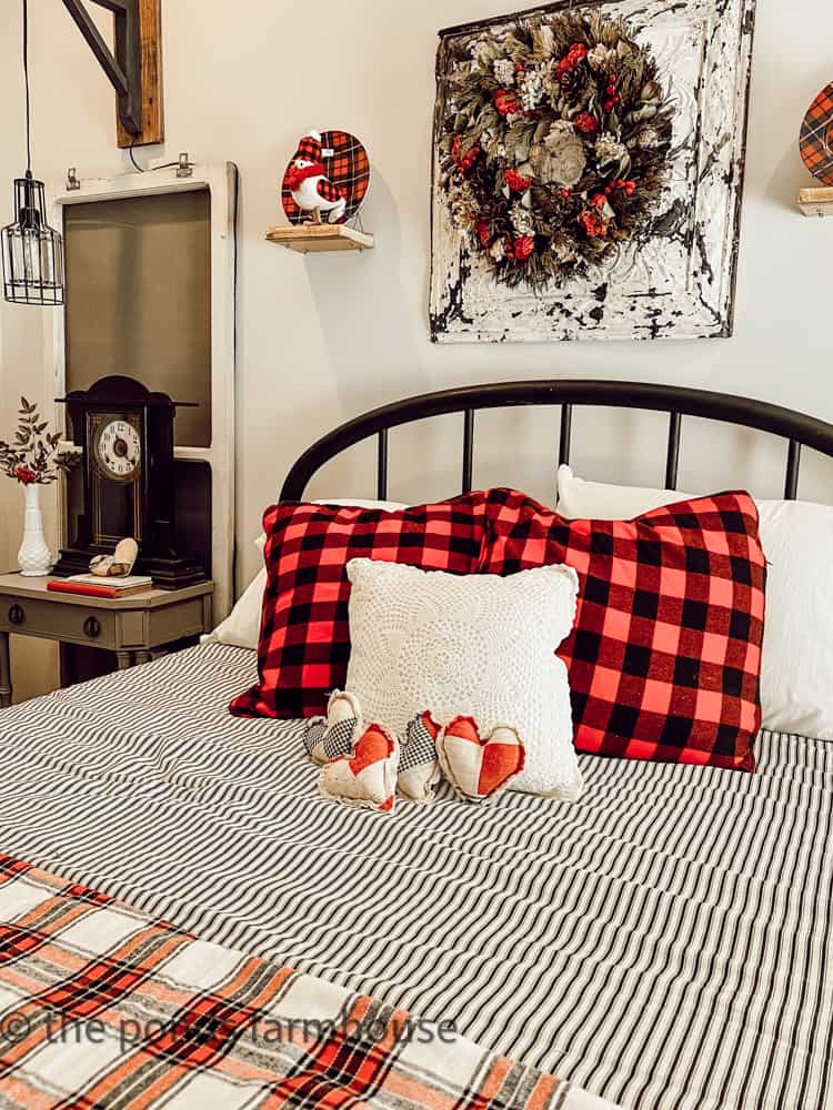 https://www.thepondsfarmhouse.com/wp-content/uploads/2023/01/Guest-Bedroom-with-buffalo-Check-pillow-and-hearts.jpg