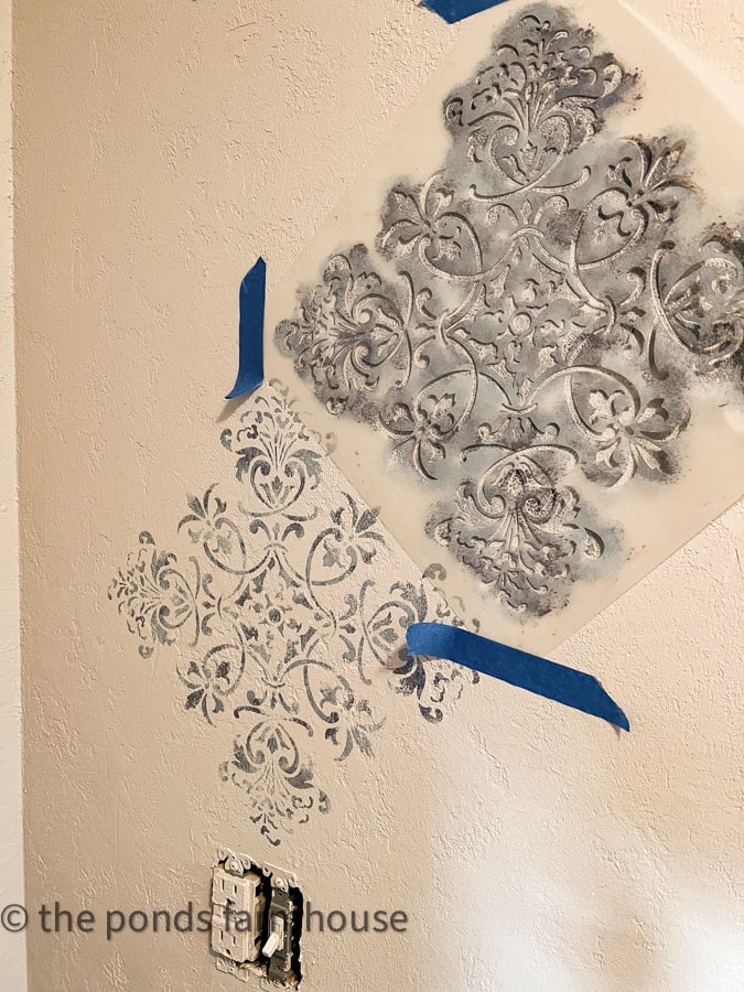 Continue to move the stencil placement to cover the entire wall for a faux wallpaper.