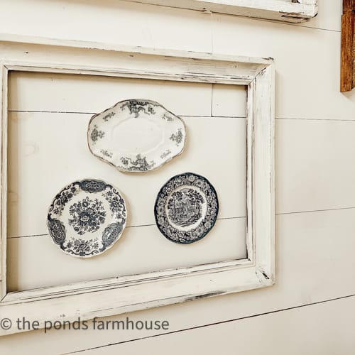 Decorative vintage plate display for dish storage solutions.  