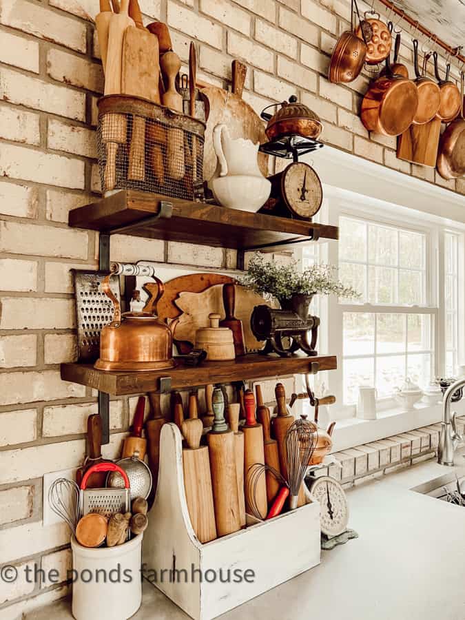 https://www.thepondsfarmhouse.com/wp-content/uploads/2023/05/vintage-kitchen-decor-with-copper-pots.jpg