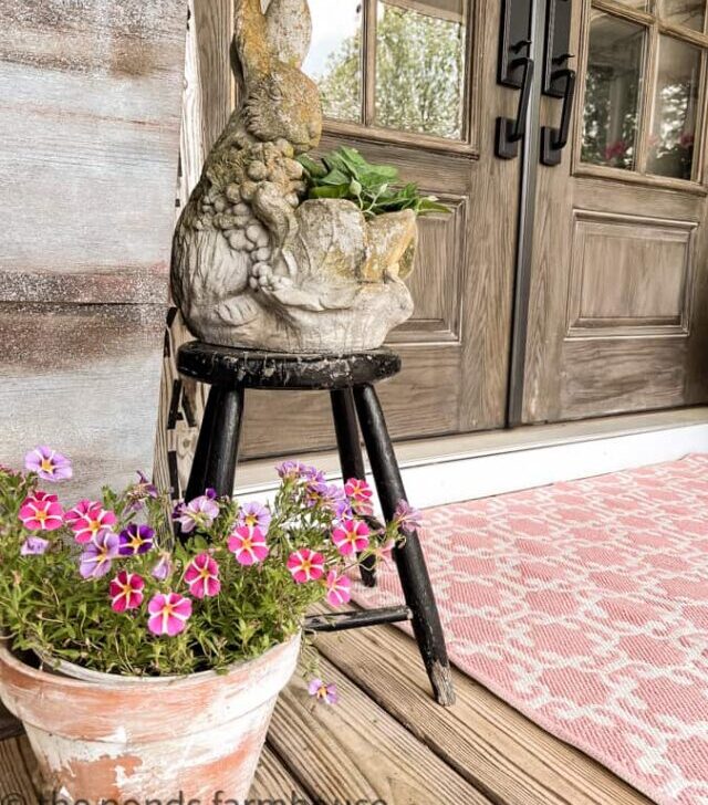 cropped-Country-Porch-aged-terra-cotta-pot-with-flowers-and-bunny-planter.jpg