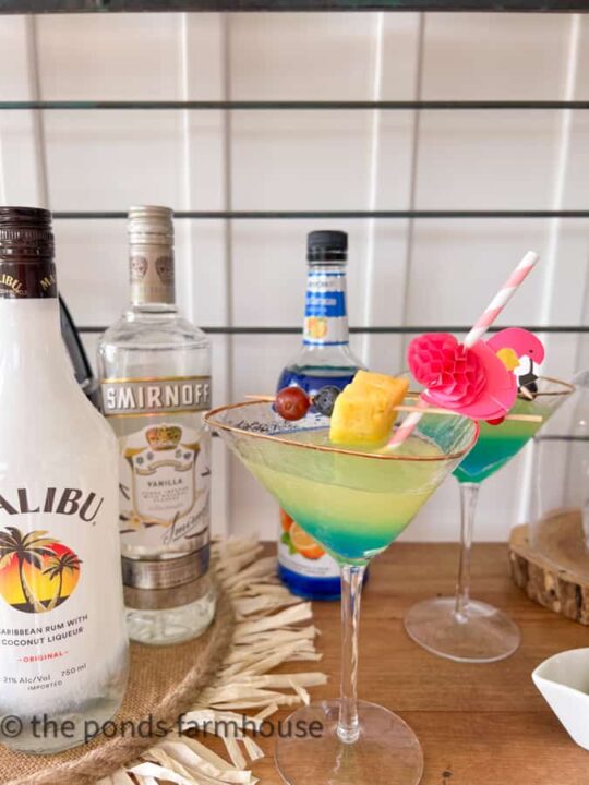 https://www.thepondsfarmhouse.com/wp-content/uploads/2023/06/pina-colada-martinis-with-flamigo-straws-540x720.jpg