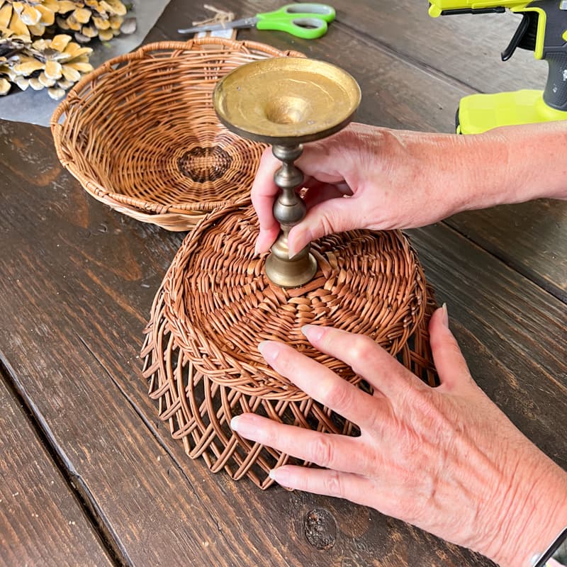 Attaching candlestick to bottom of smaller basket