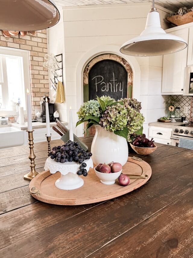 https://www.thepondsfarmhouse.com/wp-content/uploads/2023/08/cropped-Kitchen-Island-Centerpiece-with-fruit-vegetables-and-fresh-hydrangeas.jpg