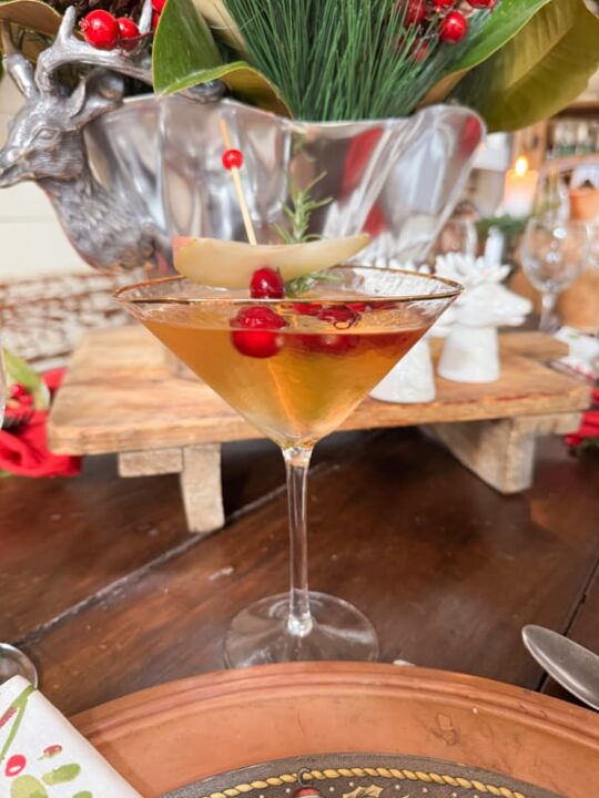 https://www.thepondsfarmhouse.com/wp-content/uploads/2023/11/Cranberry-Pear-Martini-on-table-side-view-540x720.jpg