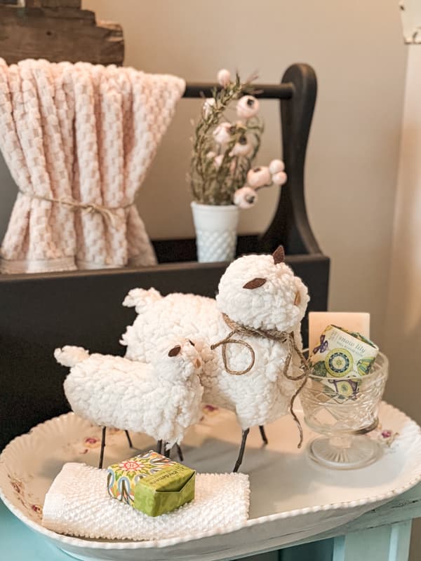 DIY Tin Can Lambs. Lambs made from tin cans covered in wool like fabric.