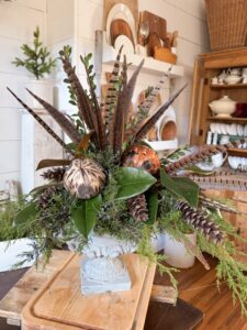 Create A Rustic-Chic Greenery and Pheasant Feather Centerpiece