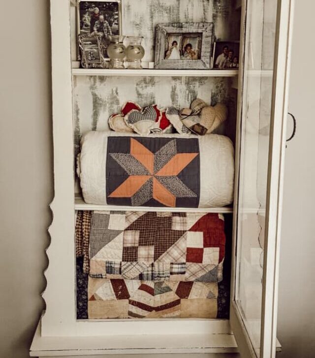 cropped-quilts-in-cabinet.jpg