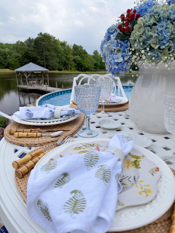 Poolside decor ideas with DIY block-print napkins and thrift store finds. 