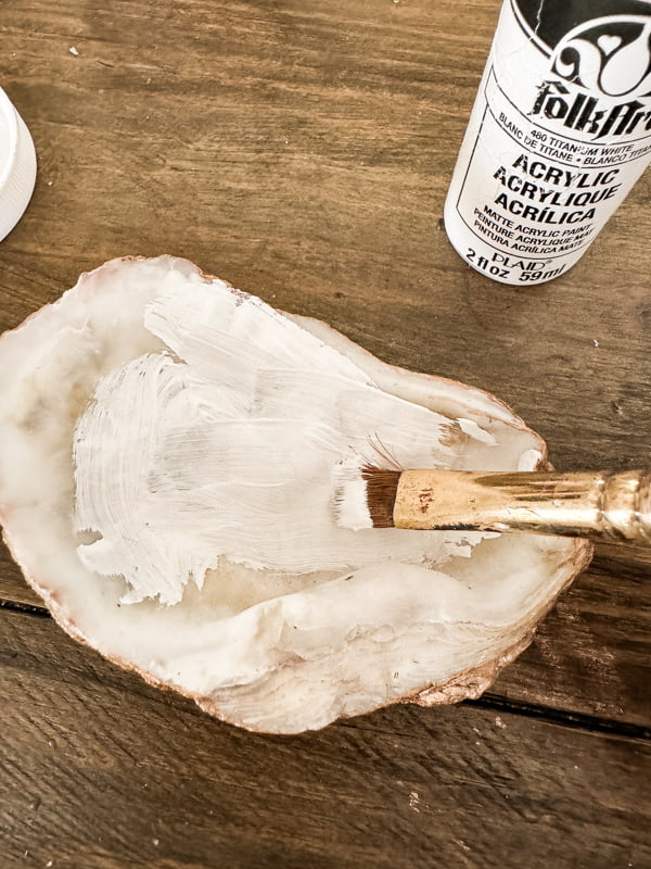 Paint inside of shell with white paint.