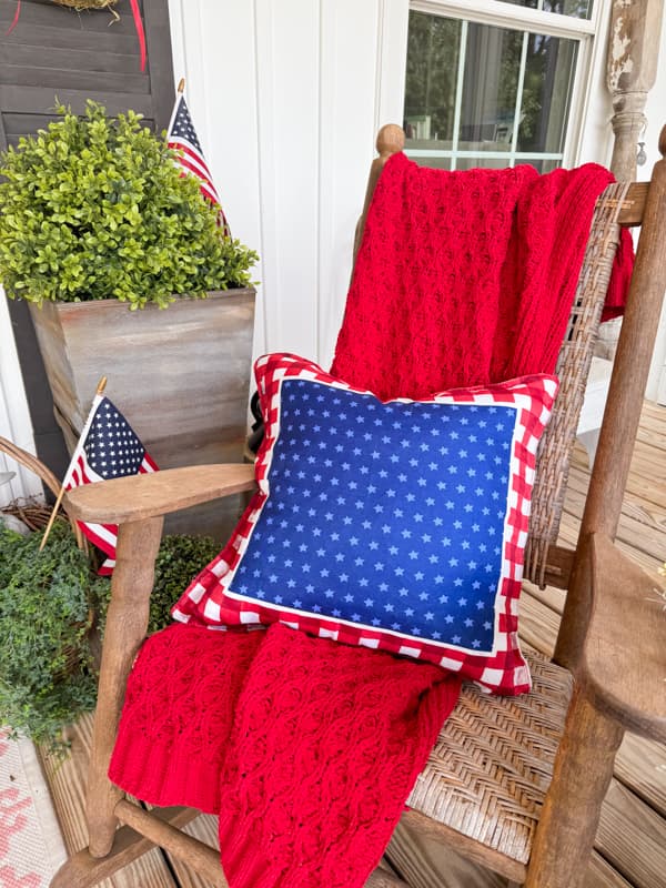 Red, white and blue patriotic pillow cover for front porch.