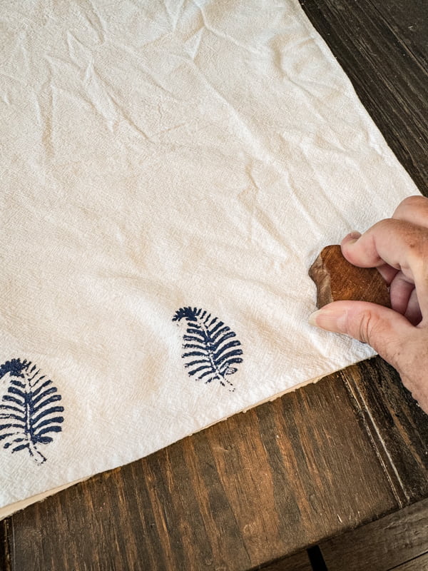 Block Stamp Napkins with blue fern on white cotton linen napkin