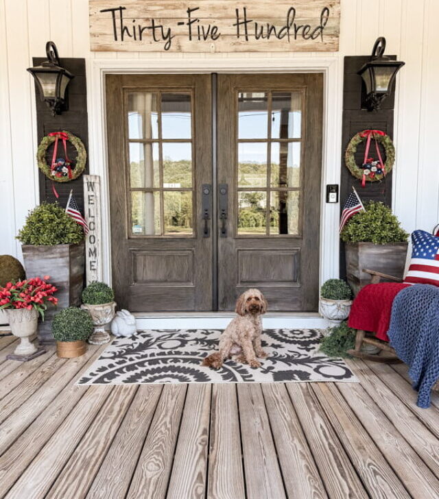 cropped-Rudy-at-front-doors-on-Rustic-Patriotic-Porch-2.jpg