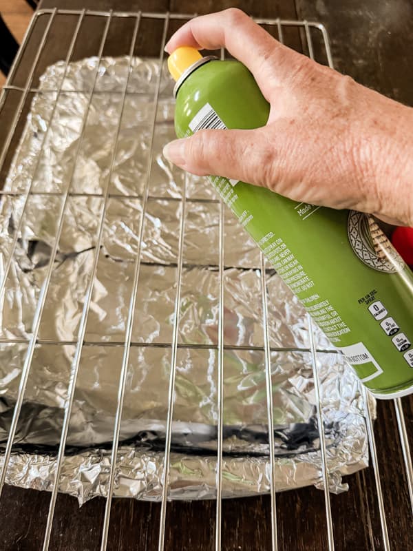 Spray baking racks with cooking spray.