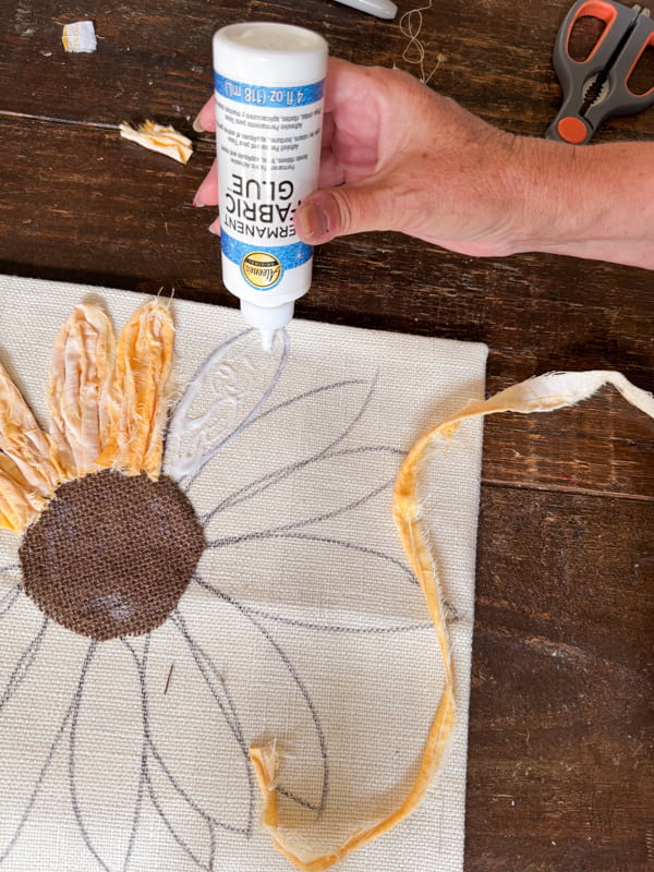 Add glue to each petal