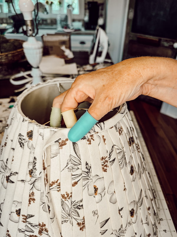 Lampshade makeover using existing lampshade and fabric. 