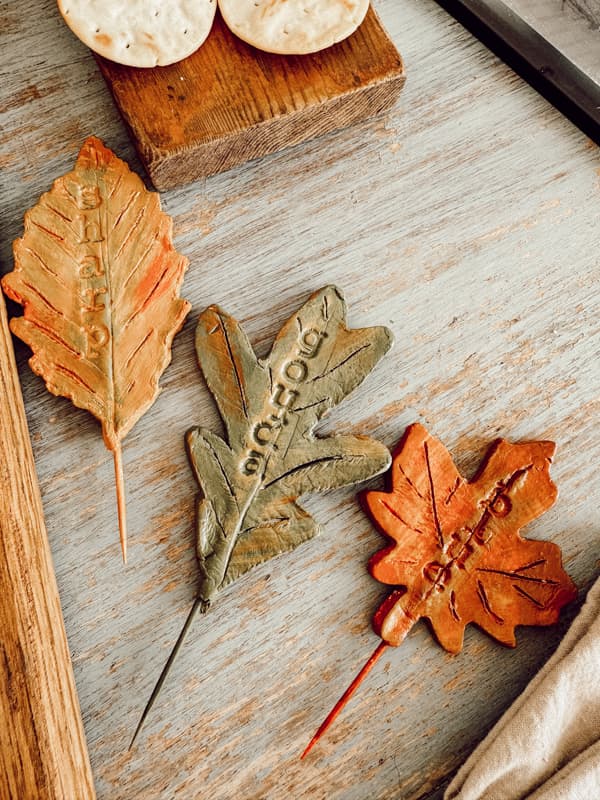 Inspired by Anthropologie's Foliage Cheese Markers - make these air-dry clay versions.  