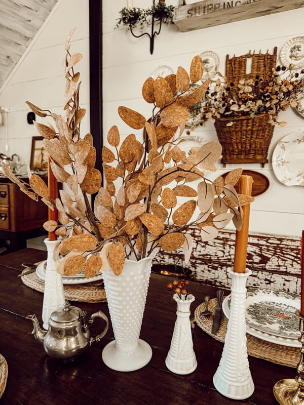 Vintage milk glass vase and white milk glass bud vase for a fall dining table centerpiece. 