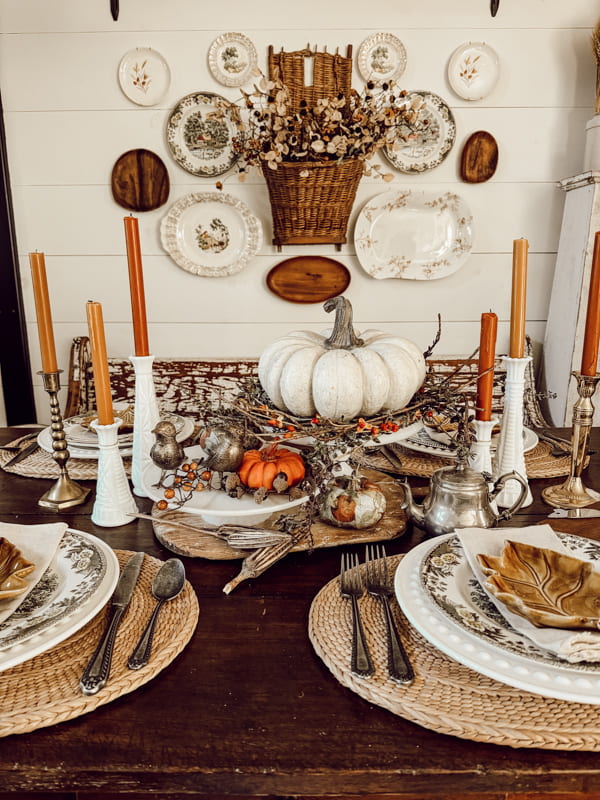 Milk Glass Centerpiece with vintage cake stands and white milk glass bud vases for candle holders.  