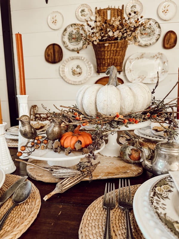 Milk Glass Centerpiece with vintage cake stands for Fall Decorating.  With pumpkins and fall florals. 