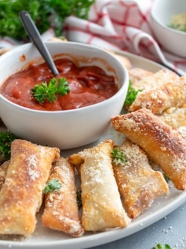 Air fry homemade pizza rolls with sauce.  