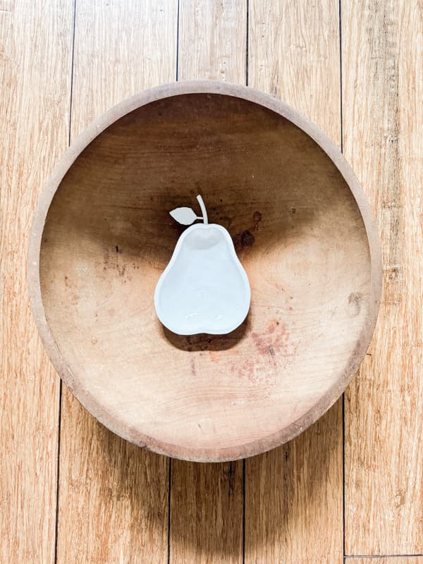 Thrift store wooden bowl and white pearl dish.  