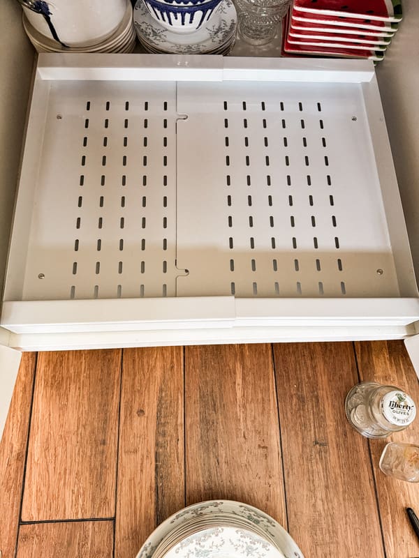 Add pull out drawers for ease of finding stored tableware