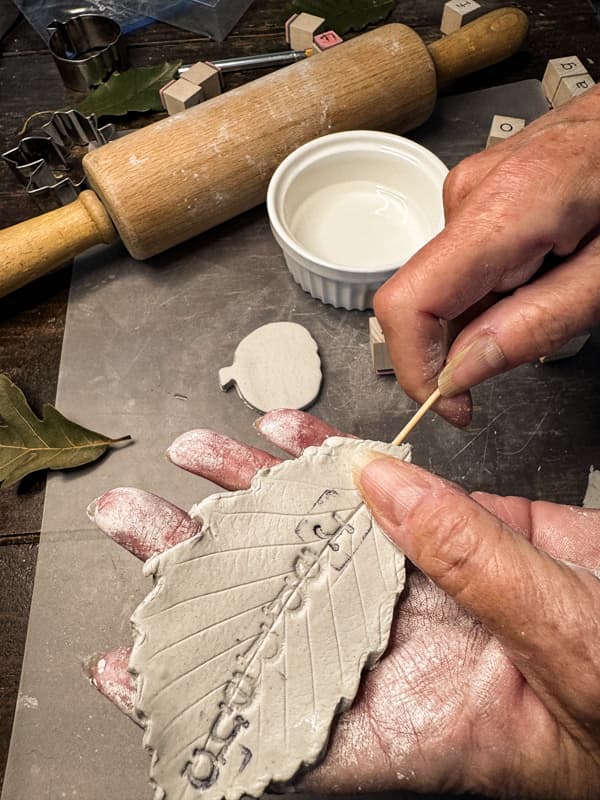 Add toothpick to the center of the air day clay 