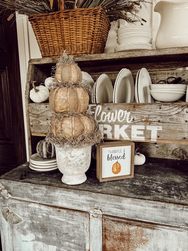 Primitive Fall Craft Topiaries with Dollar Tree Pumpkins, burlap and old book pages.  