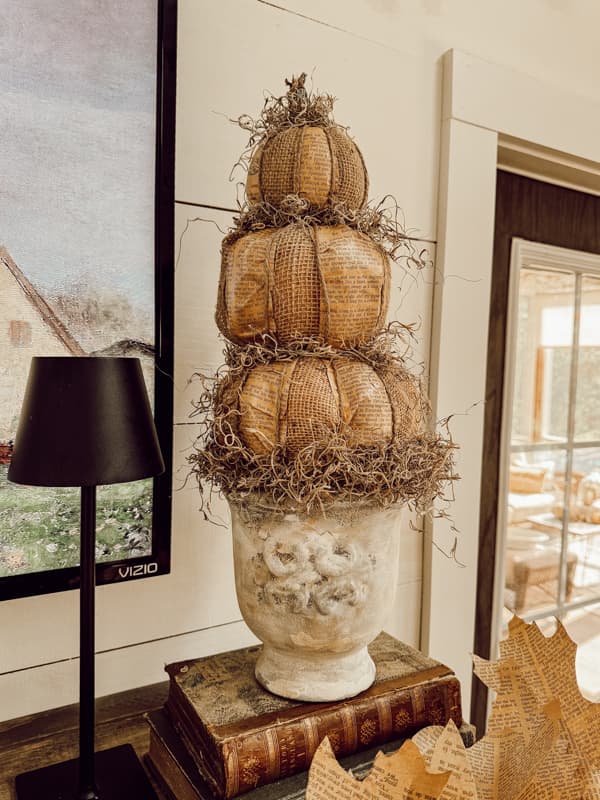 DIY pumpkin topiaries crafted from dollar tree items.