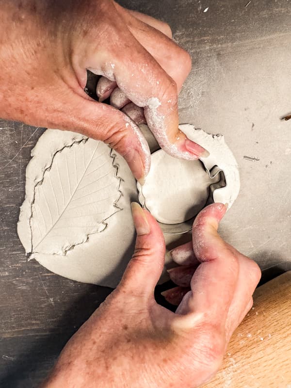 Cut clay with pumpkin cookie cutter