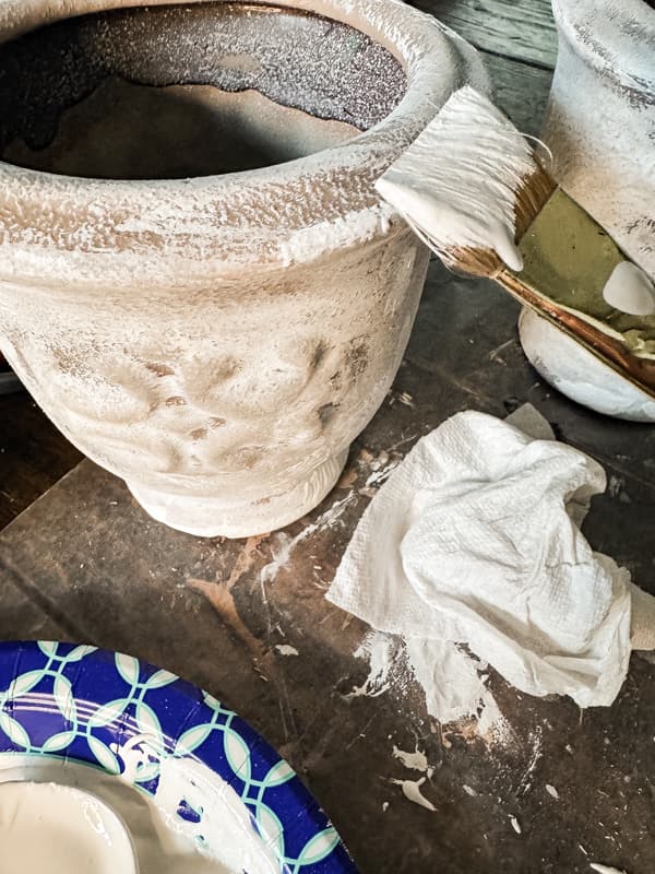 Add splashes of heavy paint for a weathered vessel Pottery Barn Look Alike.  