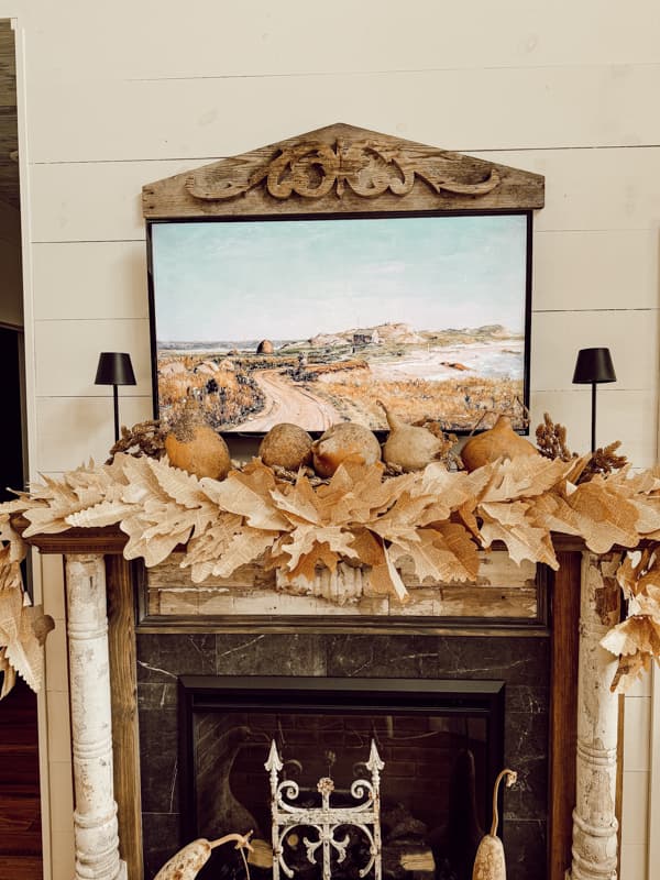 Rustic Fall Mantel Decorations with Dried gourds and DIY old book page Leaf Garland