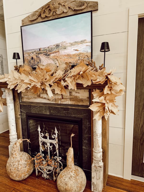 Rustic Fall Mantel Decorations with Dried gourds and DIY old book page Leaf Garland