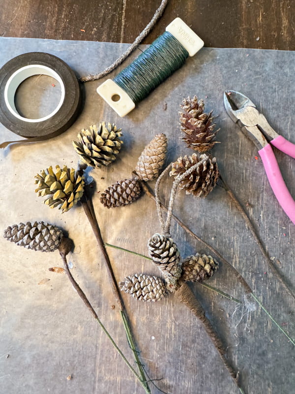 DIY Pinecone Stems for fall flower arrangement.