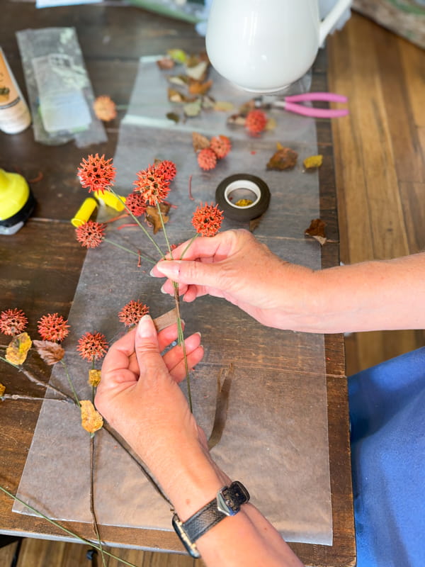 sweet gum ball stems to make fall floral arrangement 