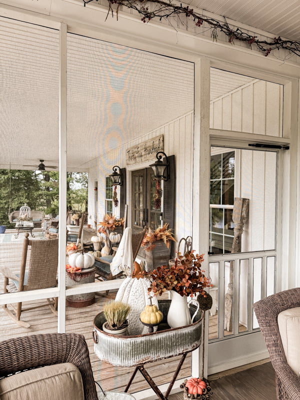 Fall decor for porches and farmhouse retreat with cozy fall decorations.  