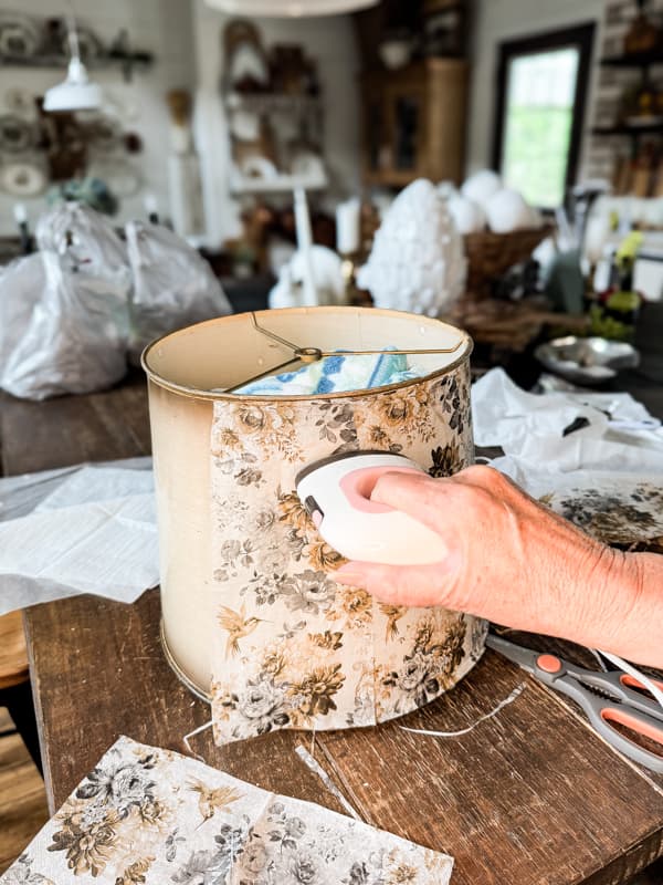 Use small heat press to adhere napkin to the lampshade without any wrinkles for napkin decoupage ideas