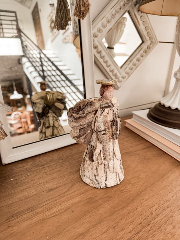 DIY Birch Bark Angel with gold candlestick holder revealed in mirror