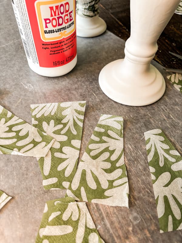 Cut decoupage Christmas paper Napkin into pieces for craft update.