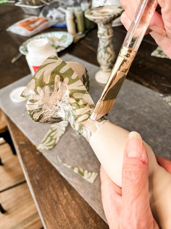 Apply decoupage Christmas Paper Napkin with a brush .